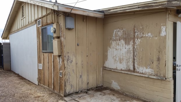 Exterior of a Fixer Upper House, Run Down Property Remodel, Peeling Paint photo