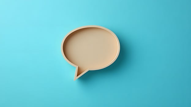 Light blue background features speech bubble cutout in paper craft style, presenting communication concept with beige balloon shape and soft shadow effects. craft photo