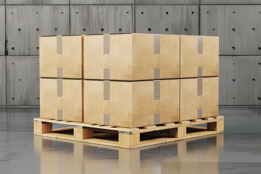 Stacked cardboard boxes on wooden pallet in warehouse photo