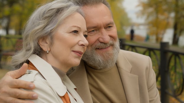 Close up senior couple love hugging in city park man woman faces happy Caucasian family embrace on romantic date old age nostalgia outdoors mature retired intelligent husband wife embracing relaxing photo