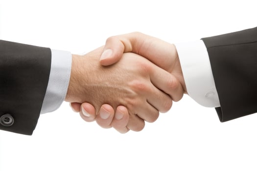 Successful handshake between colleagues symbolizing teamwork and collaboration photo