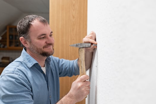 The hammer is an essential tool for any builder, requiring precision and skill for effective use. Proper technique and safety measures help prevent injuries during work. photo