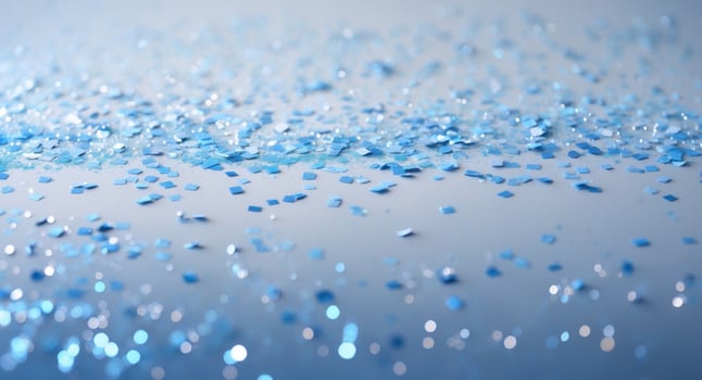 Shimmering blue confetti background texture. photo