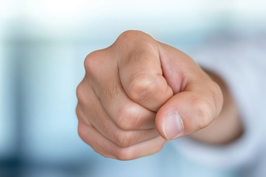 Close-up of a male hand holding a fist photo