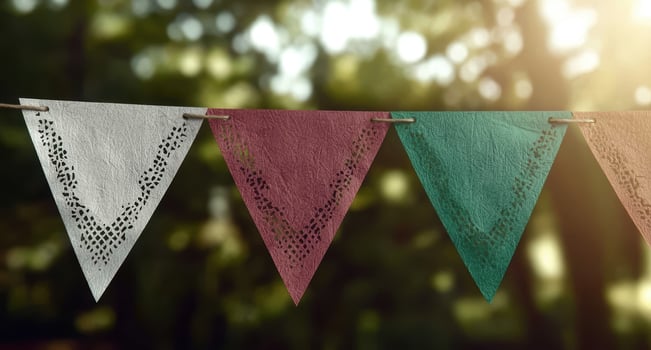 Triangular paper bunting hanging outdoors photo