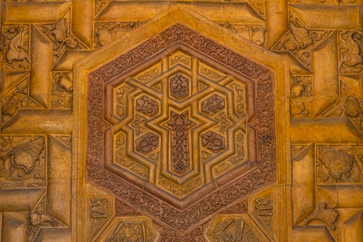 Carved stone decoration of the gate of Great Mosque and Hospital of Divrigi photo