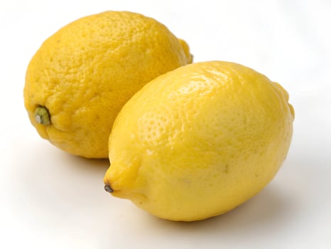 two lemons on a white background photo