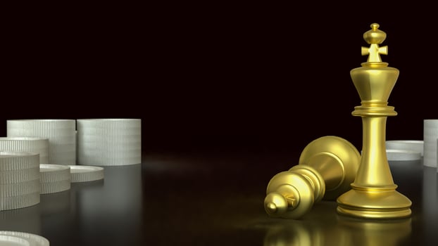 Gold chess and coins. photo