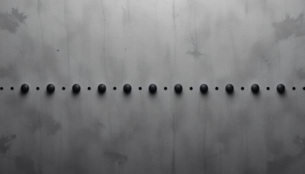 Abstract Minimalist Grey Metal Surface with Regularly Spaced Black Spheres photo