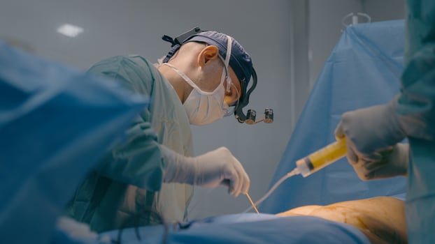 Professional medical team doctors in uniform emergency help surgical operation in clinic hospital surgeon physician medic perform surgery assisting nurse hold syringe anesthesia health aid medicine photo