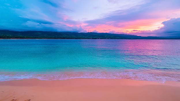 A colorful sunset over the ocean and beach photo
