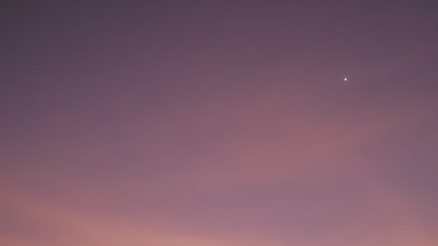 Sunset, evening sky, Beautiful clouds at dusk over the city, nature background, Beautiful dark sky and bright white stars, Colorful clouds in summer. photo