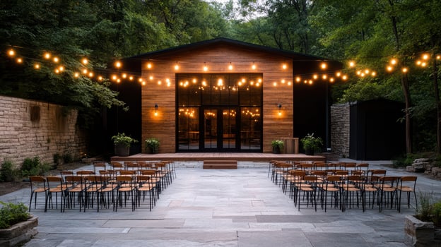 beautiful outdoor venue with string lights and seating arranged for event photo
