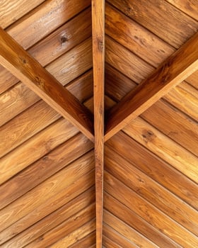 Wooden ceiling with beams and planks photo
