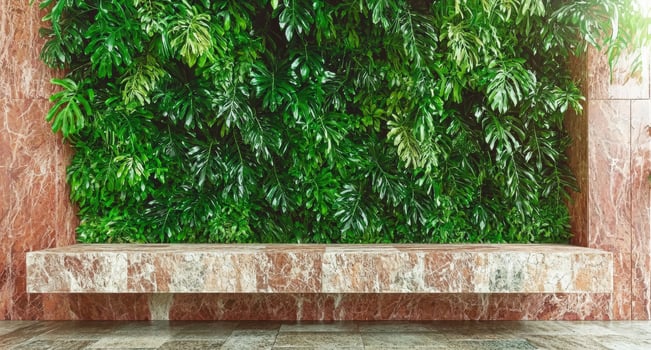 Empty marble bench with lush green plant wall background photo