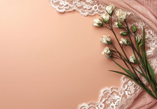 Elegant lace and delicate white roses on a peach background photo