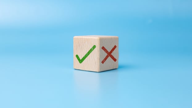 Right and wrong symbols, Green correct sign mark and red cross mark which print on wooden for approve and reject business project proposal, True and False symbols accept rejections for evaluation. photo