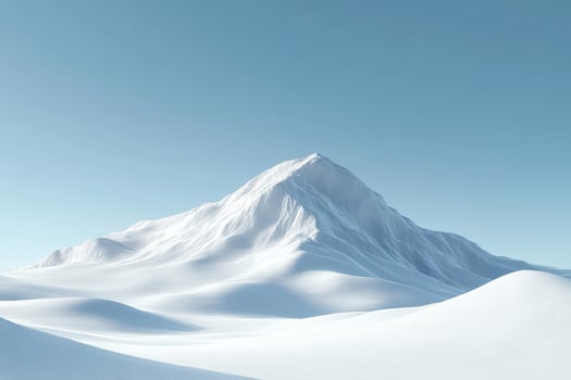 Snow-covered mountain under clear blue sky at midday photo