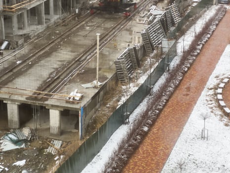 Construction of residential buildings. Scaffolding. Construction works take place in winter. Purchase of apartments. photo