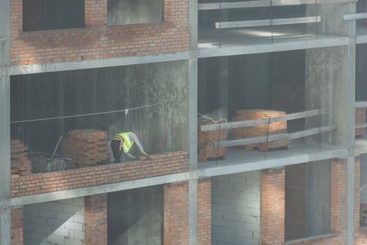 Construction of apartment buildings, dense urban development. The process of construction of residential buildings. photo