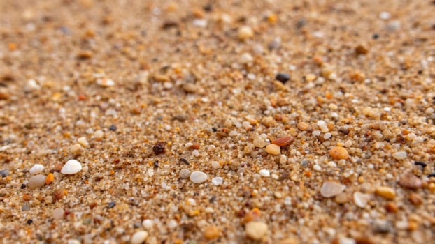 Macro shot of coarse desert sand and tiny pebbles natural landscape material composition close-up viewpoint photo