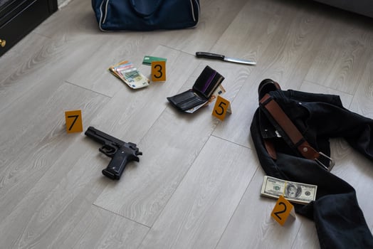 evidence markers and objects on floor of residential apartment photo
