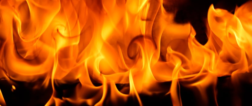 Red blaze Fire flame on a black background photo