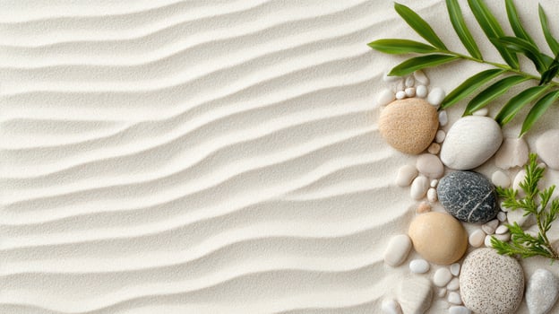 A white sand background with stones and leaves photo