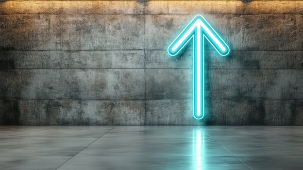 A neon arrow pointing up in a room photo