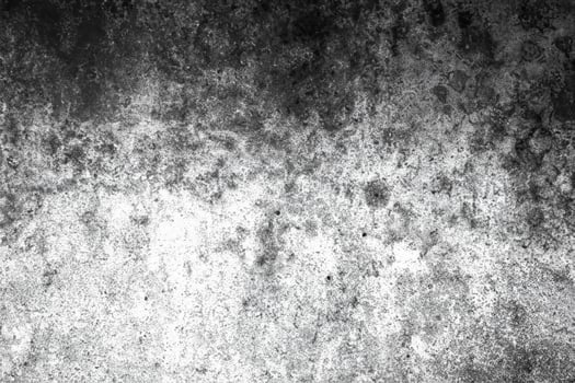 High-contrast weathered concrete texture with dark stains and rough details, ideal for backgrounds and overlays. photo