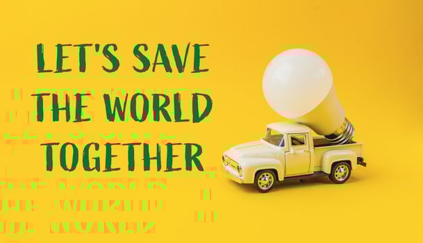 A white truck with a light bulb on top of it photo