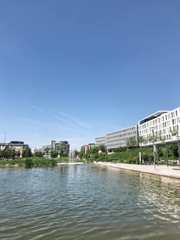 A calm body of water with a clear blue sky above photo
