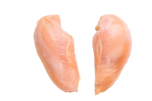 Two raw chicken breasts, sourced from an eco farm, ready for cooking, isolated on white background photo