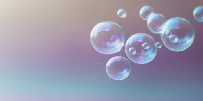 Bubbles on a pastel background near a purple and blue gradient at a close distance. photo