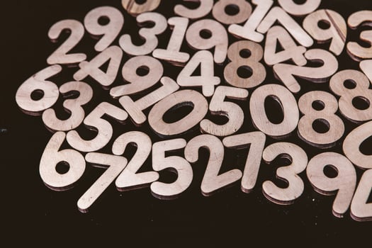 Glowing Numbers in a Futuristic Digital Design. Floating Random Numbers on a High-Tech Grid. Numbers Background, Finance and Data Concept photo