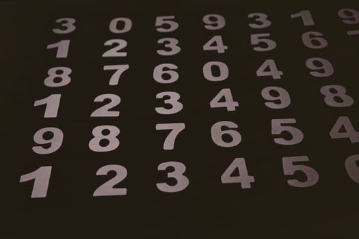 Abstract Mathematical Numbers on a Dark Background photo
