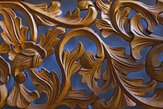 Beautiful decorative wood carving. Wooden patterns photo