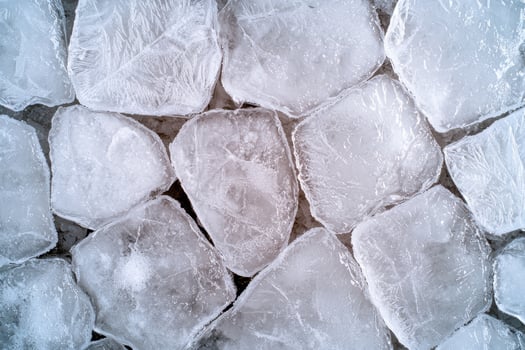 Close up of many ice cubes forming a textured background photo