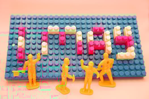 Labor Day Concept Small Workers with 1 May Blocks photo