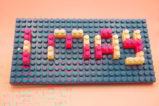 Creative 1 May Concept with Colorful Toy Blocks photo