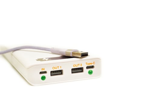 White power bank, usb cable for charging various gadgets, phones photo