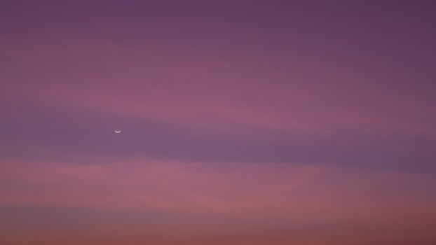 Evening sky, Beautiful clouds at dusk over the city, Moon and star, Nature background, Beautiful dark sky and bright white stars, Colorful clouds in summer photo