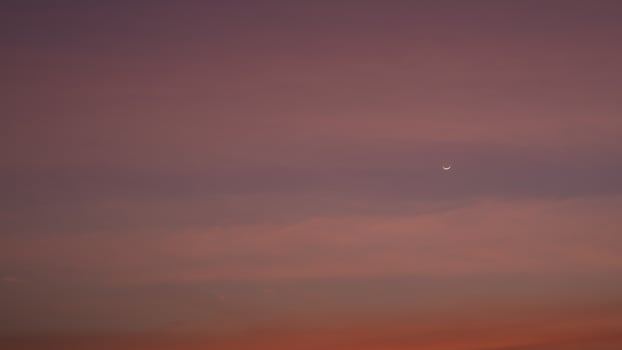 Sunset, Evening sky, Moon and star, Beautiful clouds at dusk over the city, Nature background, Beautiful dark sky and bright white stars, Colorful clouds in summer, Peaceful and beautiful sunset. photo
