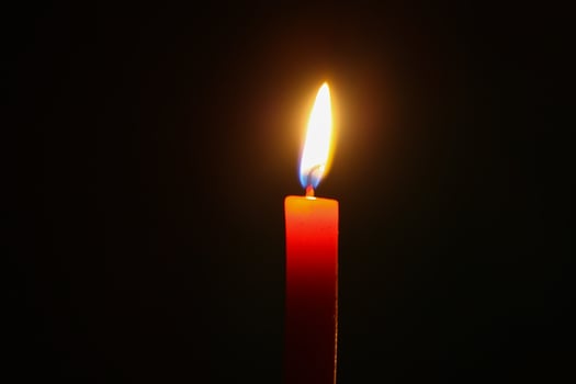 Close-up of a red candle photo