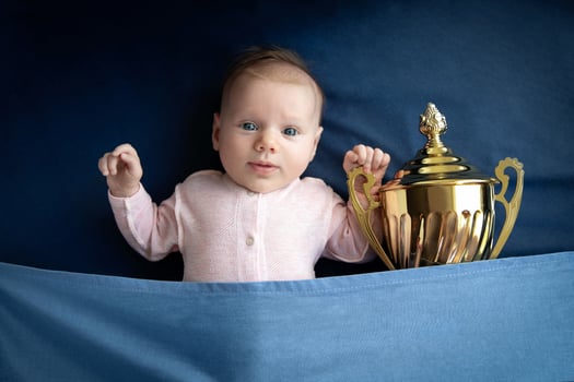 child with a golden cup photo