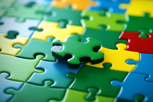 Last green jigsaw puzzle piece completing the puzzle photo