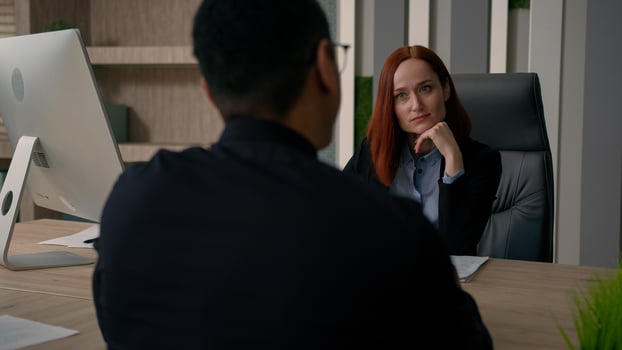 Two colleagues partners multiracial African american businessman Caucasian businesswoman talk in office business negotiation discuss deal startup financial investment bank insurance offer negotiate photo