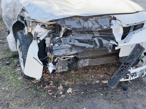 A close-up of the front car, which was demolished by an accident, collided with an electric pole until it was severely damaged. photo