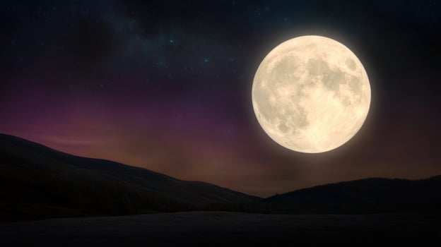 Full moon illuminates a starry night sky over dark mountains photo