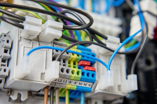 Electrical wires connecting to electrical circuit board in distribution box photo